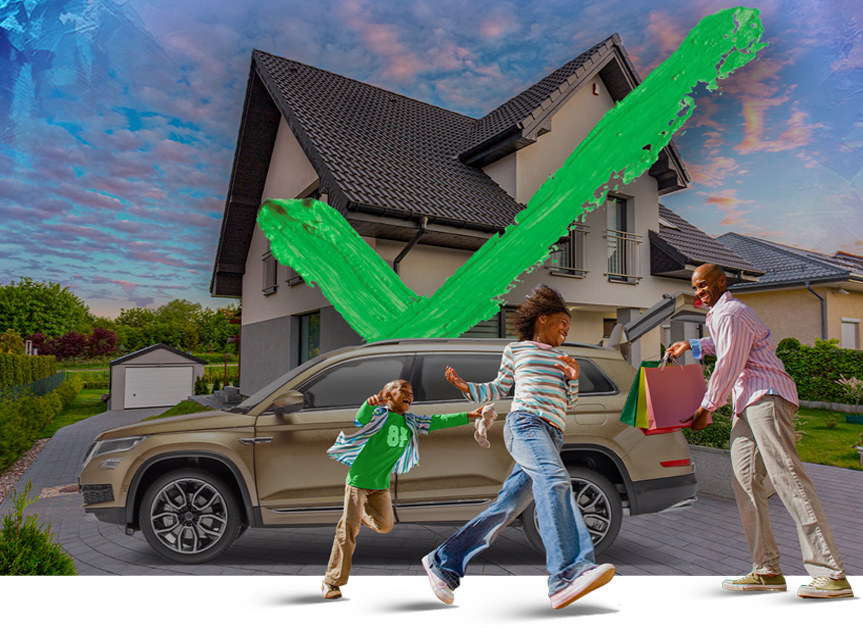 Father unpacking bags in front of his brand-new house and car while his two kids play nearby.